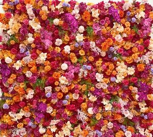 Hot pink and orange artificial flower wall backdrop for weddings and parties